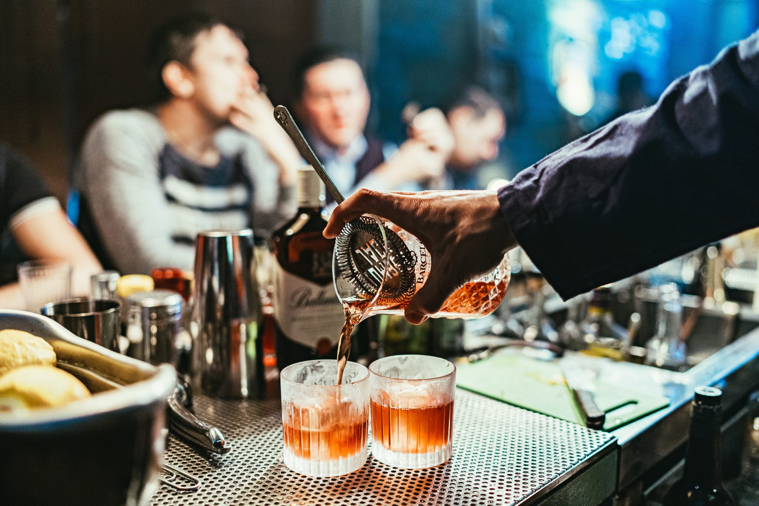 Man preparing drinks in bar