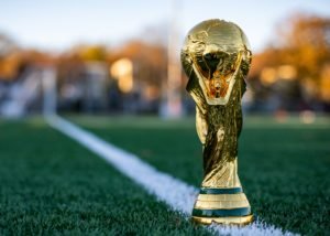 Trophy in a field representing article on sweepstakes for Fifa World Cup 