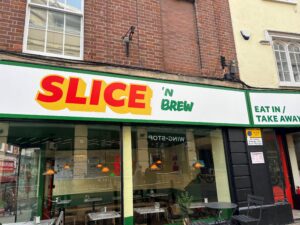 Image of restaurant sign saying, Slice N Brew in Nottingham City Centre